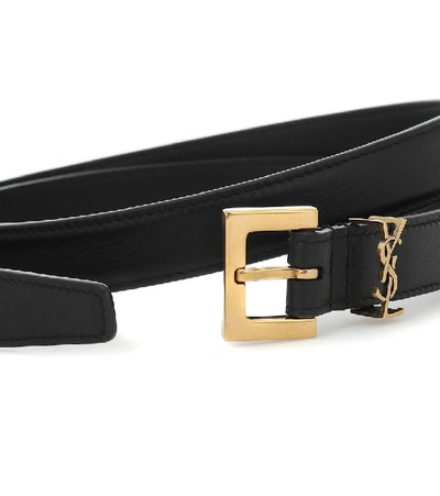 Shop Saint Laurent Cassandre Slim Leather Belt In Black