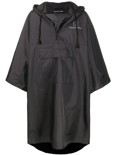 Shop Acne Studios Logo-print Poncho-style Raincoat In Black