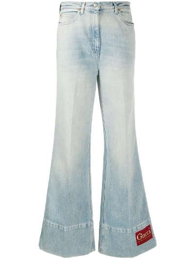 Shop Gucci Glitter Logo Flared Jeans In Blue