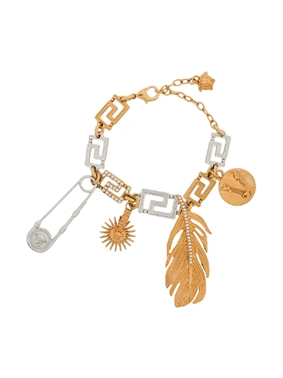 Shop Versace Greca Charms Bracelet In Gold