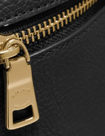 Shop Coach Belt Bag In Gold/black