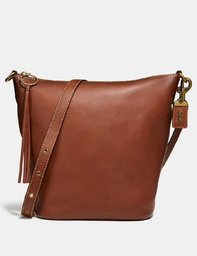 Shop Coach Duffle - Women's In Brass/1941 Saddle