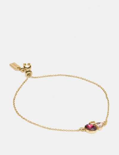 Shop Coach Signature Crystal Cluster Slider Bracelet - Women's In Gold/red