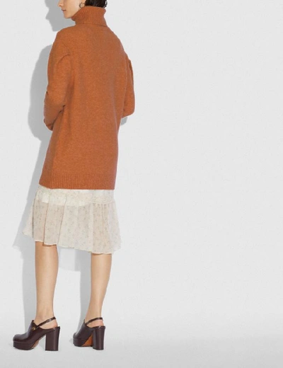 Shop Coach Statement Sleeve Turtleneck - Women's In Rust