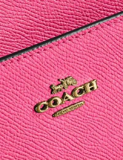 Shop Coach Kitt Messenger Crossbody In Brass/confetti Pink