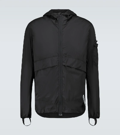 Shop Satisfy Packable Windbreaker Jacket In Black