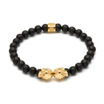 Shop Northskull Matte Black Onyx & Gold Medius Twin Skull Bracelet