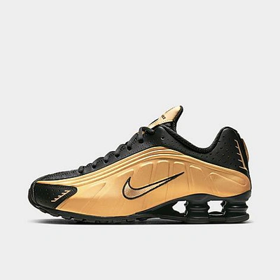 Shop Nike Shox R4 Casual Shoes In Metallic Gold/black