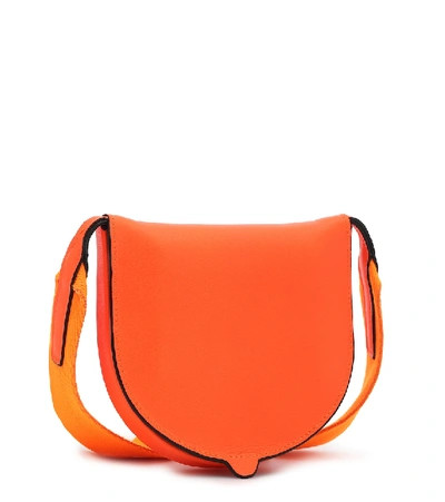 Shop Loewe Heel Pouch Small Leather Crossbody Bag In Orange