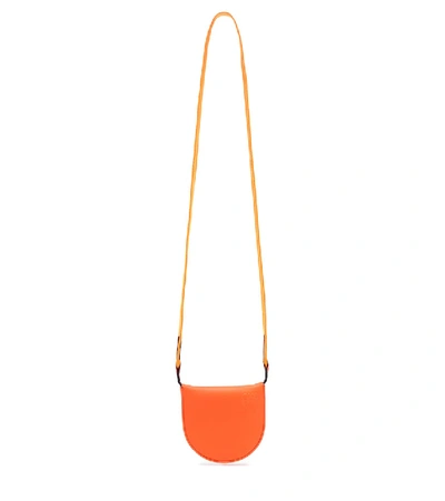 Shop Loewe Heel Pouch Small Leather Crossbody Bag In Orange