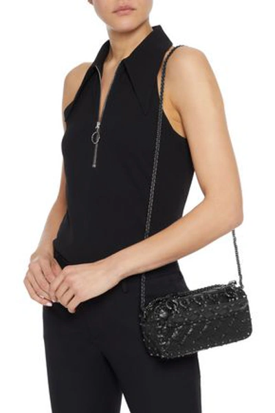 Shop Valentino Rockstud Spike Small Quilted Cracked-leather Shoulder Bag In Black