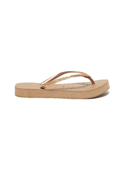 Shop Havaianas Glitter Slim Flatform Thong Sandals In Brown