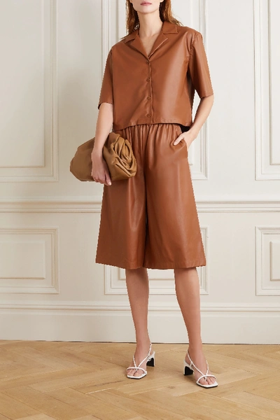 Shop Tibi Faux Leather Shorts In Brown