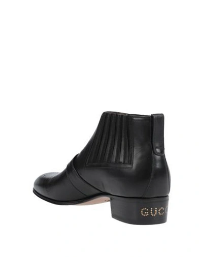 Shop Gucci Boots In Black