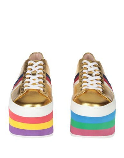 Shop Gucci Sneakers In Gold