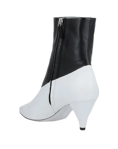 Shop Givenchy Ankle Boots In White