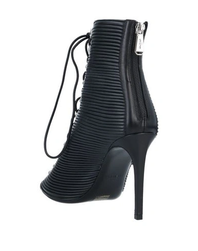 Shop Balmain Ankle Boots In Black