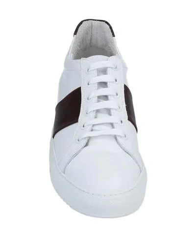 Shop National Standard Sneakers In White