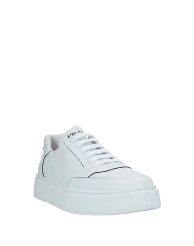 Shop Prada Sneakers In White