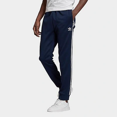 Shop Adidas Originals Adidas Men's Classics Adicolor Primeblue Sst Track Pants Size Small Cotton/polyester/plastic In Collegiate Navy/white