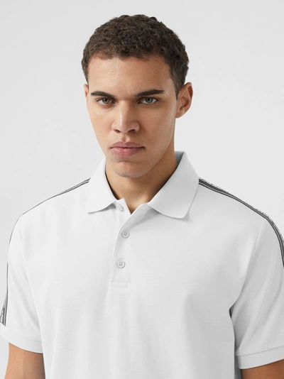 Shop Burberry Logo Tape Cotton Piqué Polo Shirt In White