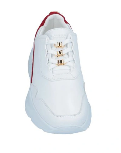 Shop Buscemi Sneakers In White