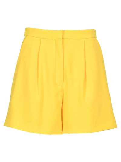 Shop Kenzo Pleated Shorts In Yellow