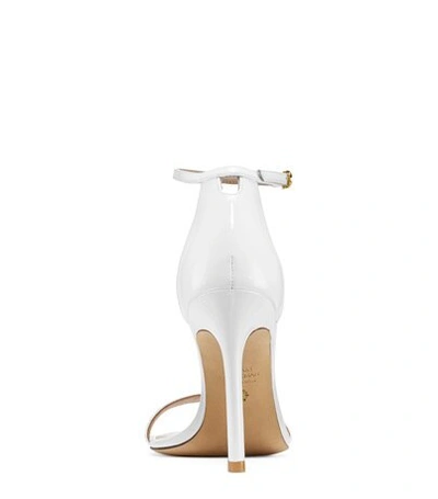 Shop Stuart Weitzman Nudistsong In White Patent Leather