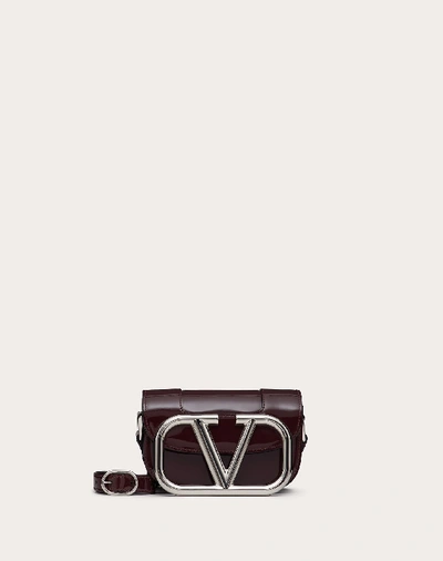 Shop Valentino Garavani Small Supervee Patent Crossbody Bag In Rubin