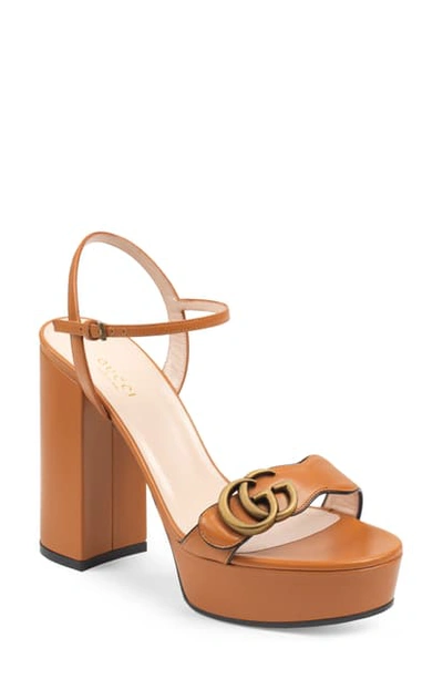 Shop Gucci Gg Platform Sandal In Cognac