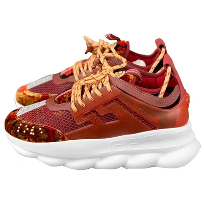 Versace chain store reaction burgundy