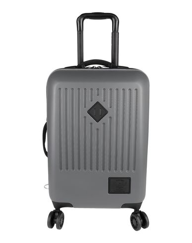 white herschel suitcase
