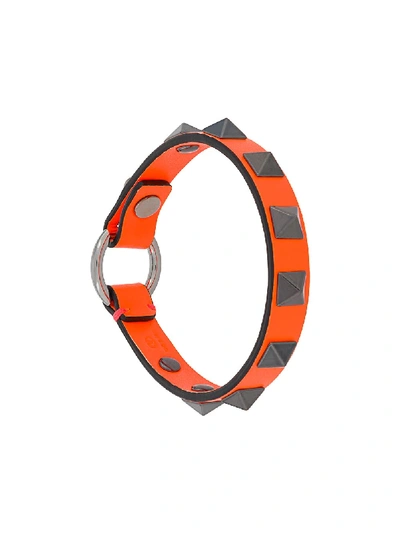 Shop Valentino Rockstud Bracelet In Orange