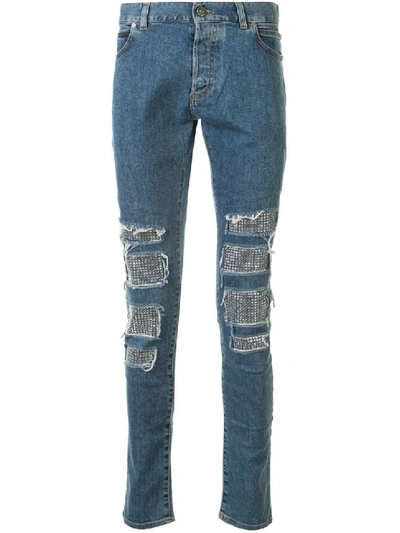 Shop Balmain Studded Distressed Skinny Jeans In Blue