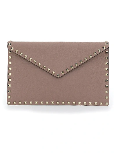 Shop Valentino Garavani Rockstud Envelope Clutch In Brown