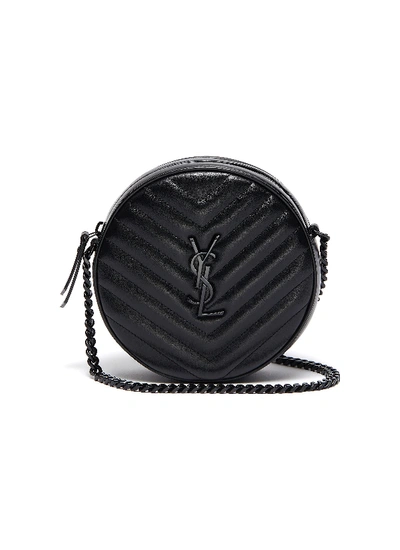 Shop Saint Laurent Logo Appliqué Round Leather Crossbody Bag In Black