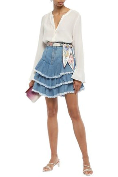 Shop Zimmermann Bowie Tiered Frayed Denim Mini Skirt In Light Denim