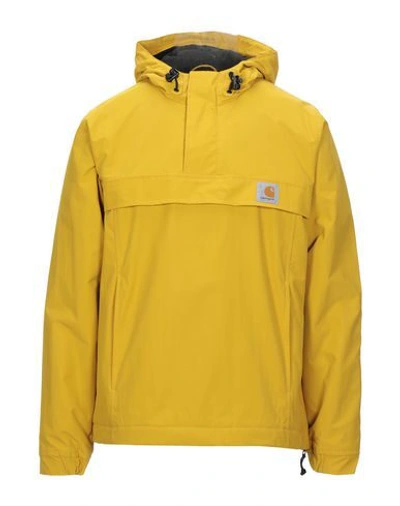 Shop Carhartt Jackets In Yellow