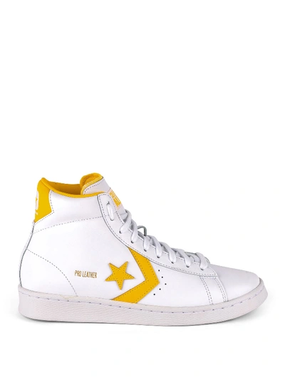 Shop Converse Pro Leather High Top Sneakers In White