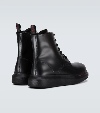 Shop Alexander Mcqueen Hybrid Lace-up Boots In Black