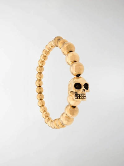 Shop Alexander Mcqueen Skull Multibeaded Bracelet In Gold