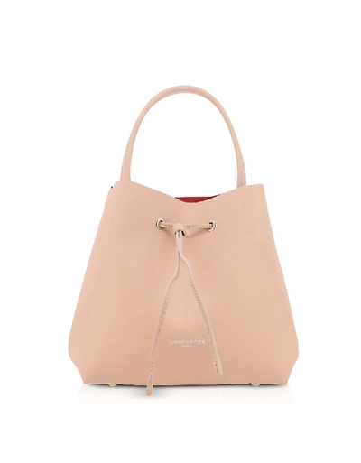 Shop Lancaster Handbags Pur & Element City Bucket Bag In Powder