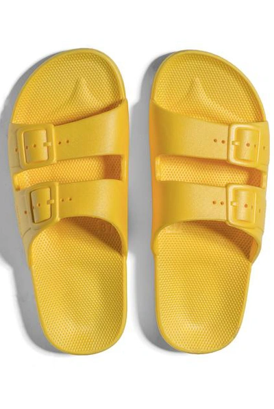 Shop Freedom Moses Sunny Slides In Yellow