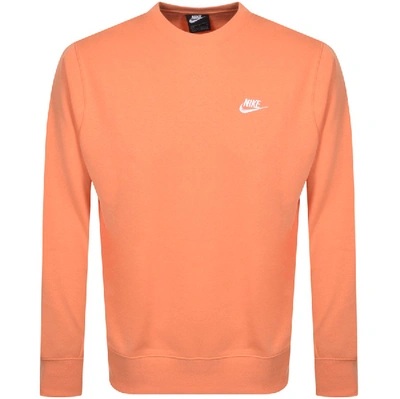 Shop Nike Crew Neck Club Sweatshirt Orange