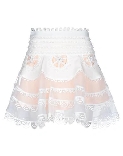 Shop Amuse Mini Skirts In White