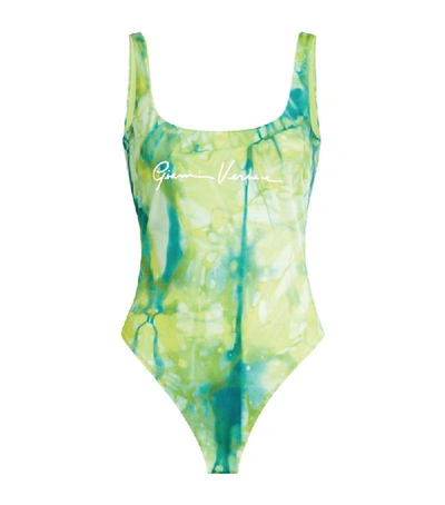 Shop Versace Leaf Logo Print Swimsuit