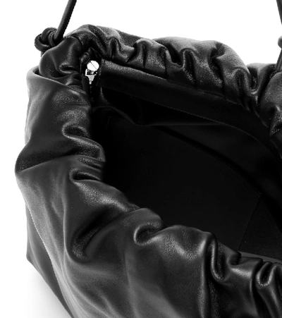 Shop Bottega Veneta The Fringe Pouch Leather Shoulder Bag In Black