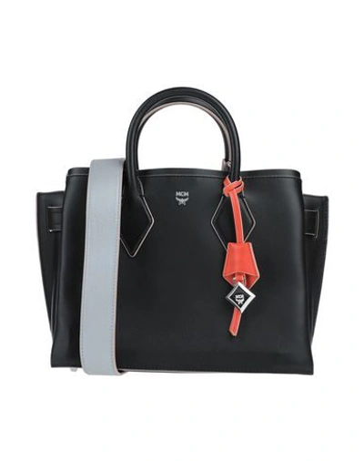 Shop Mcm Handbag In Black