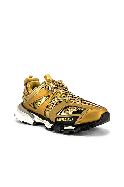 Balenciaga Metallic Track Sneakers In 8000 Gold | ModeSens