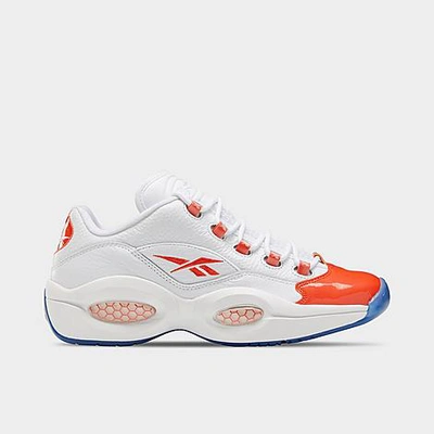 Shop Reebok Men's Question Low Patent Basketball Shoes In White